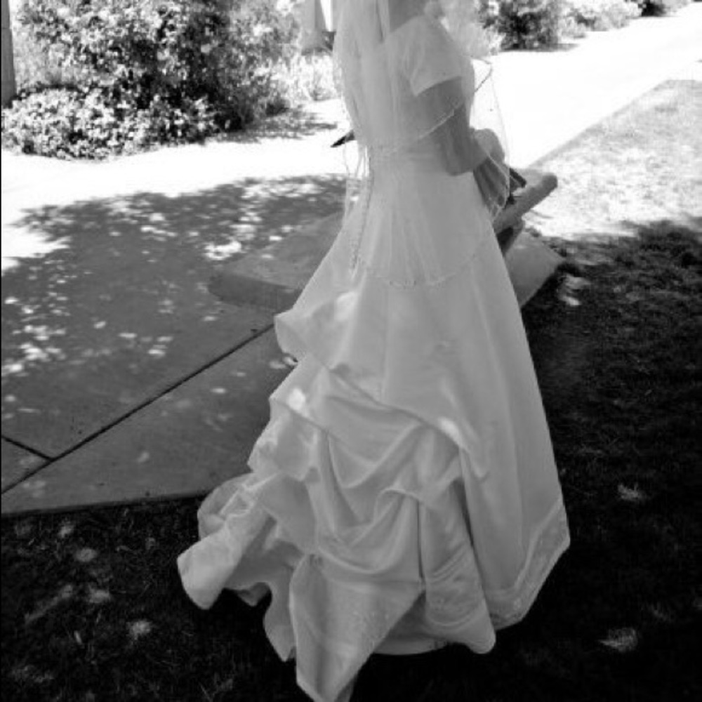 Beautiful white beaded flower wedding dress